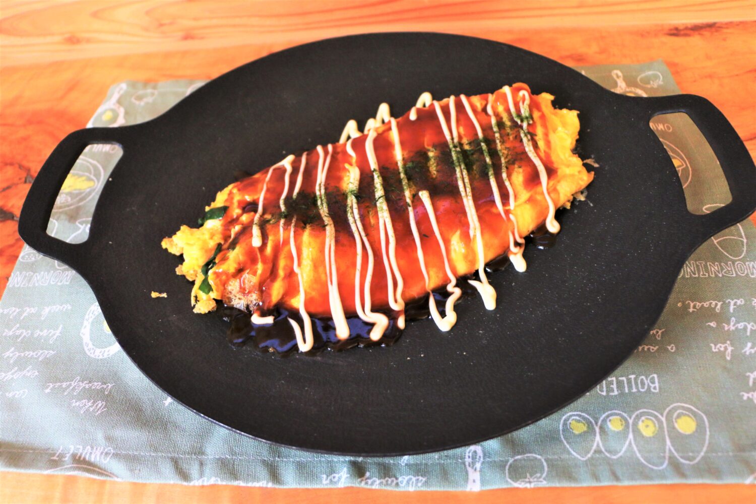 ニラチーズとん平焼きの写真(高知県高知市)